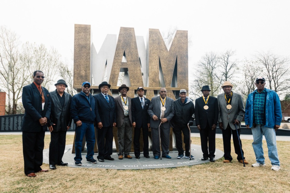 <strong>The last surviving sanitation workers involved in the strike and march of 1968 stand at the center of the I Am A Man Plaza during an unveiling ceremony on April 5, 2018.</strong> (The Daily Memphian file)