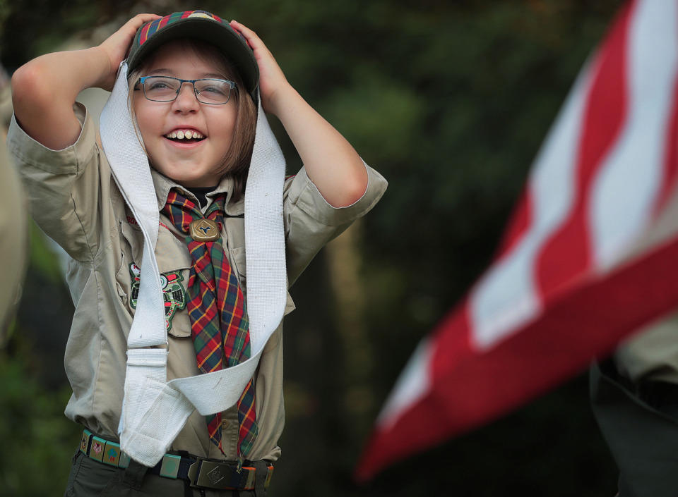 <strong>Cooper Bruce struggles a little with his flag-carrying harness before the start of the 70th annual Independence Day Parade in the High Point Terrace neighborhood on July 4, 2019. Once again East Memphis residents gathered for a patriotic morning of star-spangled bikes, waving neighbors and a dousing by the Memphis Fire Department.</strong> (Jim Weber/Daily Memphian)