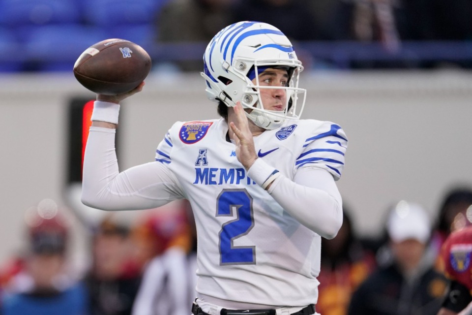 <strong>Memphis quarterback Seth Henigan (2) looks to throw a pass during the first half of the Liberty Bowl NCAA college football game against Iowa State, Friday, Dec. 29, 2023, in Memphis, Tenn.</strong> (AP Photo/George Walker IV)