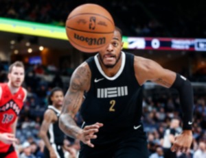 <strong>Memphis Grizzlies forward Xavier Tillman Sr. scrambles for a rebound against the Toronto Raptors on Wednesday, Jan. 3, 2024.</strong> (Mark Weber/The Daily Memphian)