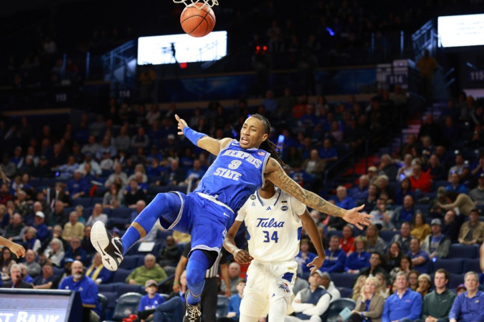 <strong>Memphis guard Caleb Mills (9) slips on the floor while shooting and injures himself on Thursday, Jan. 4, 2024, in Tulsa, Oklahoma.</strong> (Joey Johnson/AP)
