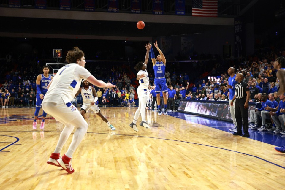 <strong>Memphis guard Jahvon Quinerly (11) hits the game-winning shot against Tulsa on Thursday, Jan. 4, 2024, in Tulsa, Oklahoma.</strong> (Joey Johnson/AP)
