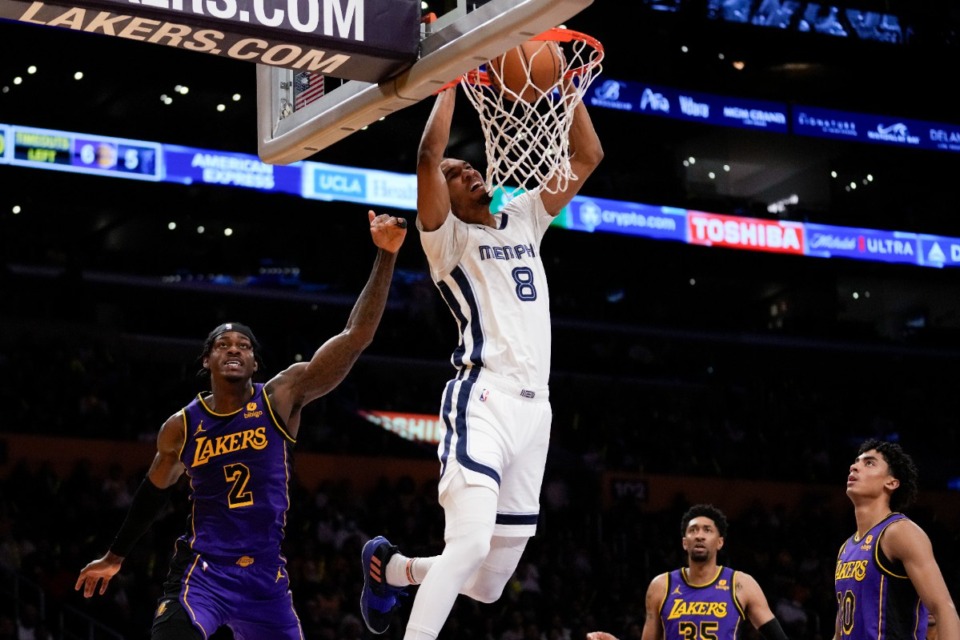 <strong>Los Angeles Lakers forward Jarred Vanderbilt (2) fouls Memphis Grizzlies forward Ziaire Williams (8) as he dunks in Los Angeles, Friday, Jan. 5, 2024.</strong> (Ashley Landis/AP)