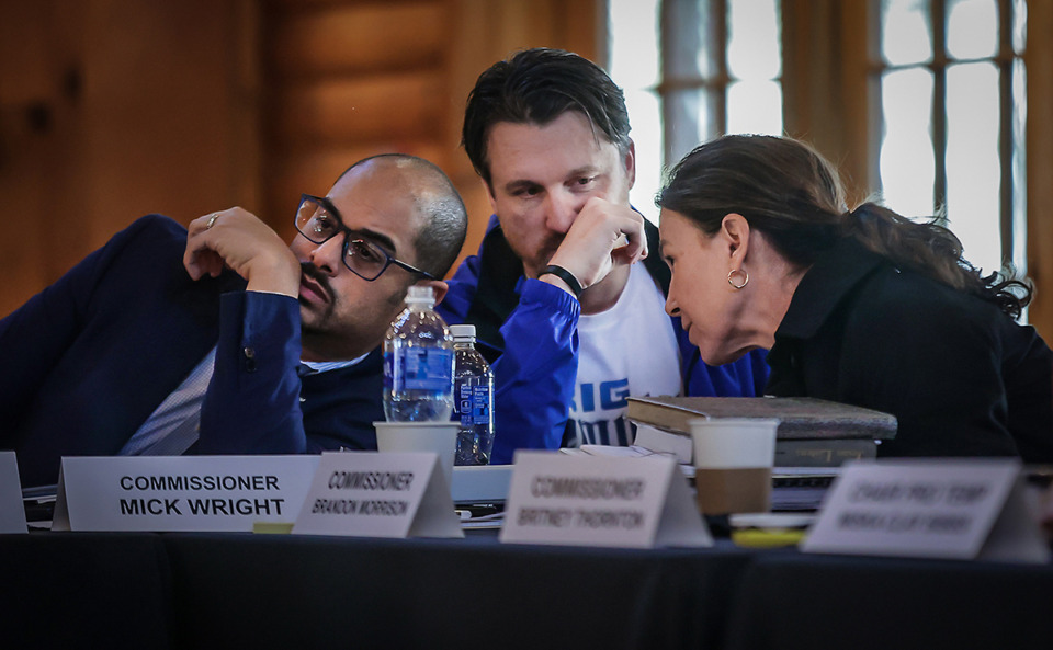 <strong>From left: Shelby County Commissioners Edmund Ford Jr., Mick Wright and Brandon Morrison huddle up during a budget retreat at the Memphis Zoo March 4, 2023.</strong> (Patrick Lantrip/The Daily Memphian file)