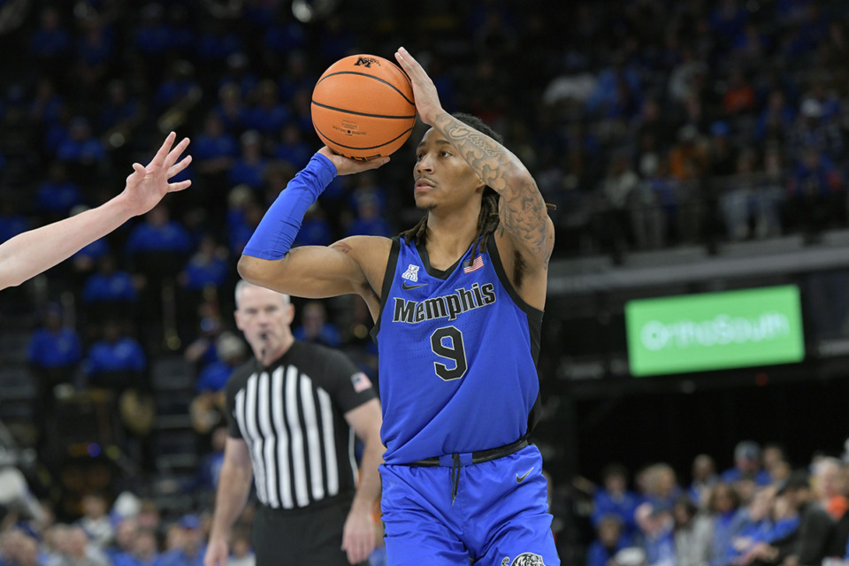 <strong>Memphis guard Caleb Mills (9) plays during the first half of an NCAA college basketball game against Virginia Tuesday, Dec. 19, 2023, in Memphis.</strong> (Brandon Dill/AP Photo file)
