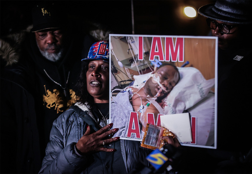 <strong>RowVaughn Wells, the mother of Tyre Nichols, holds up a picture of her son on life support shortly before his death. Wells was at a vigil honoring the one-year anniversary of her son's death at the hands of Memphis Police Department officers on Jan. 7, 2023.</strong> (Patrick Lantrip/The Daily Memphian)