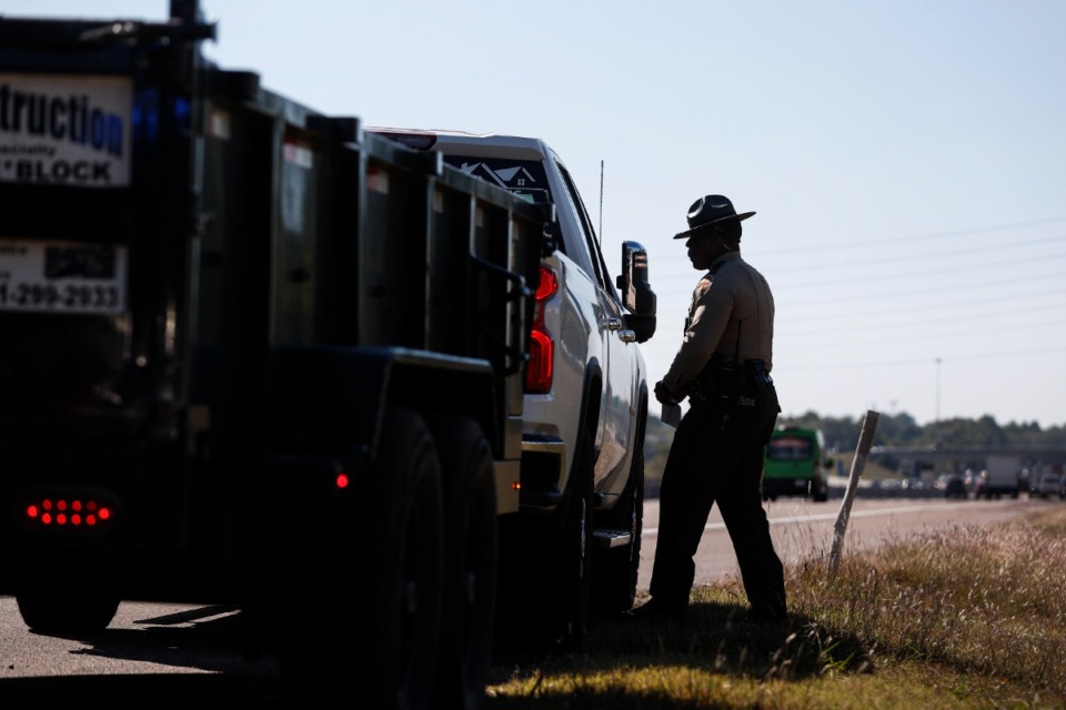 <strong>Tennessee Highway Patrol trooper Devonte Quinn conducts a traffic stop on I-40 on Wednesday, Oct. 18, 2023.</strong> (Mark Weber/The Daily Memphian file)