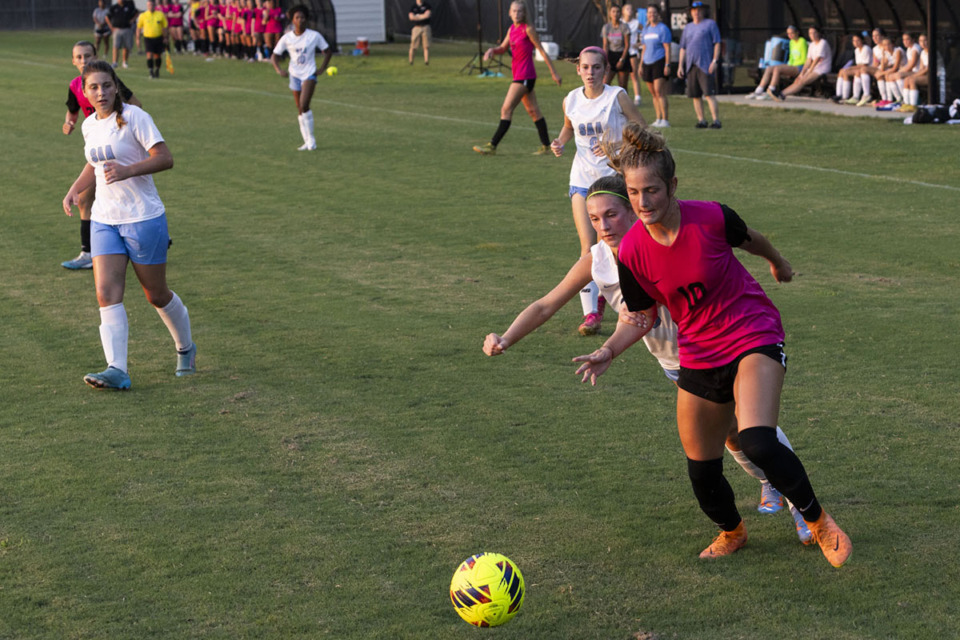 <strong>Houston&rsquo;s Ellett Smith (right) works for the ball during a game against St. Agnes at Houston Middle School on Aug. 22, 2023.&nbsp;The Tennessee Sportswriters Association (TSWA) named Smith to the 2023 Girls Soccer All-State team.</strong> (Brad Vest/Special to The Daily Memphian file)
