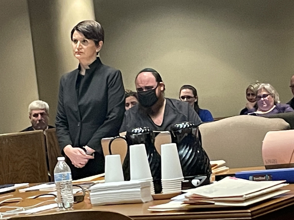 <strong>Joel Bowman, seated right, and his attorney Lauren Fuchs listen to testimony from a friend during a motion hearing on Monday, Jan. 8. Bowman is accused of bringing a firearm to Margolin Hebrew Academy and firing shots on July 31, 2023.</strong> (Julia Baker/The Daily Memphian)