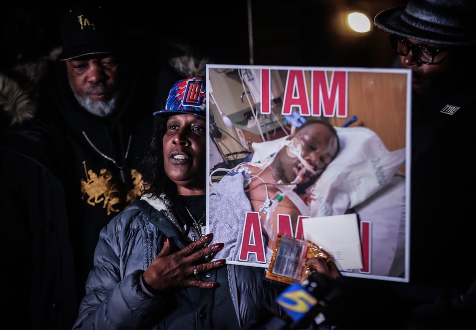 <strong>RowVaughn Wells, the mother of Tyre Nichols, holds up a picture of her son on life support shorty before his death. Wells was at a vigil honoring the one-year anniversary of her son&rsquo;s death at the hands of the Memphis Police Department Jan. 7, 2023.</strong> (Patrick Lantrip/The Daily Memphian)