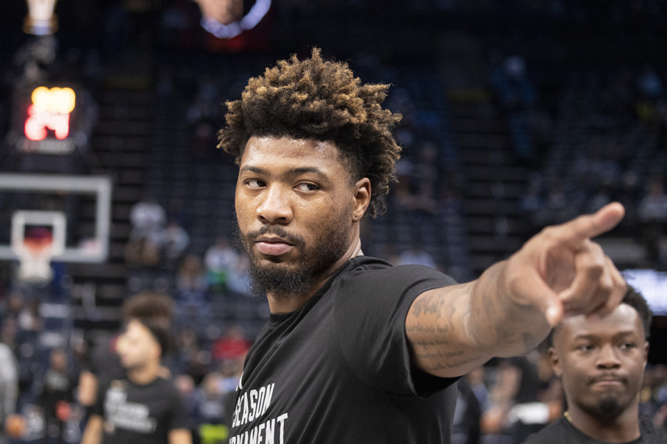 <strong>Memphis Grizzlies guard Marcus Smart left the game against Dallas with a finger injury.</strong> (Nikki Boertman/AP file)