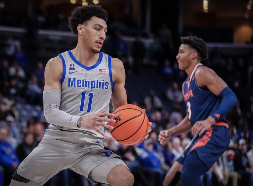 <strong>University of Memphis guard Jahvon Quinerly (11) grabs a rebound and looks to kick off a fast break against UTSA on Jan. 10, 2024.</strong> (Patrick Lantrip/The Daily Memphian)