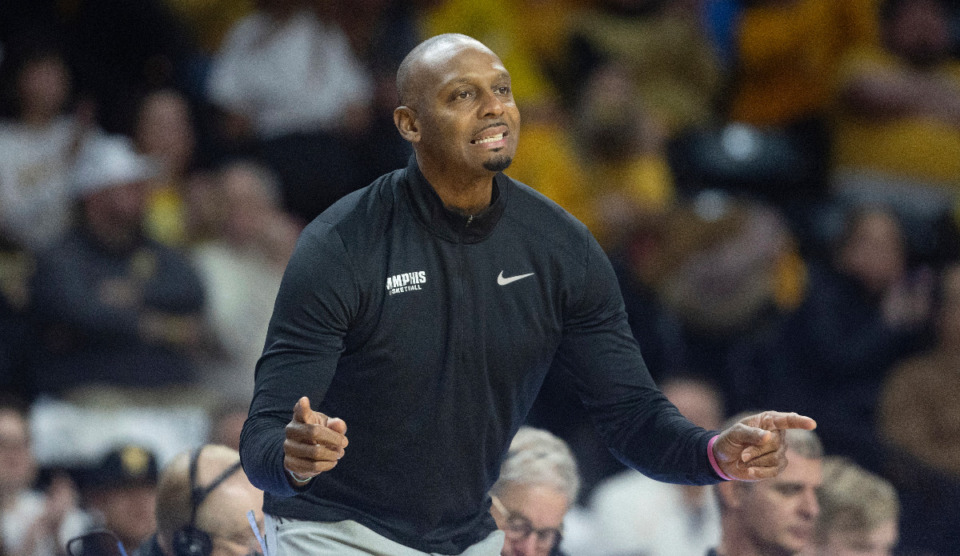 <strong>Memphis coach Penny Hardaway encourages his team during the first half of an NCAA college basketball game Jan. 14 in Wichita, Kan.</strong> (Travis Heying/The Wichita Eagle via AP)
