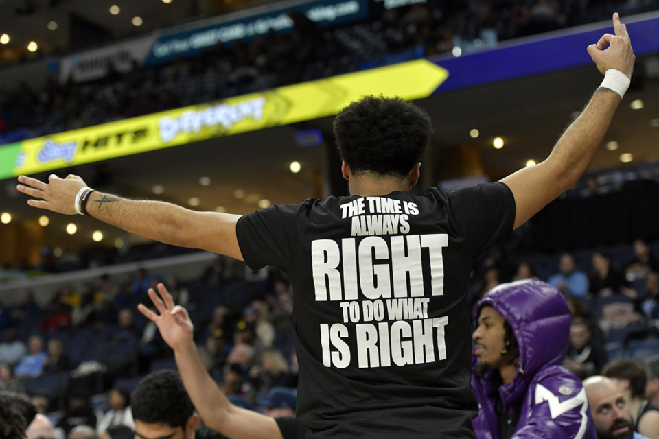 <strong>Memphis Grizzlies guard Jacob Gilyard wears a shirt honoring Martin Luther King Jr. before an NBA basketball game against the Golden State Warriors Jan. 15 in Memphis.</strong> (Brandon Dill/AP file)