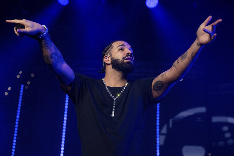 <strong>Drake performs during Lil Baby's Birthday Party at State Farm Arena on Dec. 9, 2022, in Atlanta.&nbsp;Drake has rescheduled his upcoming Memphis concert.</strong> (Paul R. Giunta/Invision/AP file)