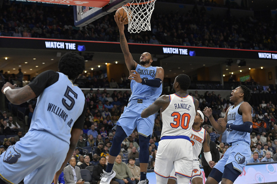 <strong>Memphis Grizzlies forward Xavier Tillman (2) shoots over New York Knicks forward Julius Randle (30) during the second half of an NBA basketball game Jan. 13 in Memphis.</strong> (Brandon Dill/AP file)