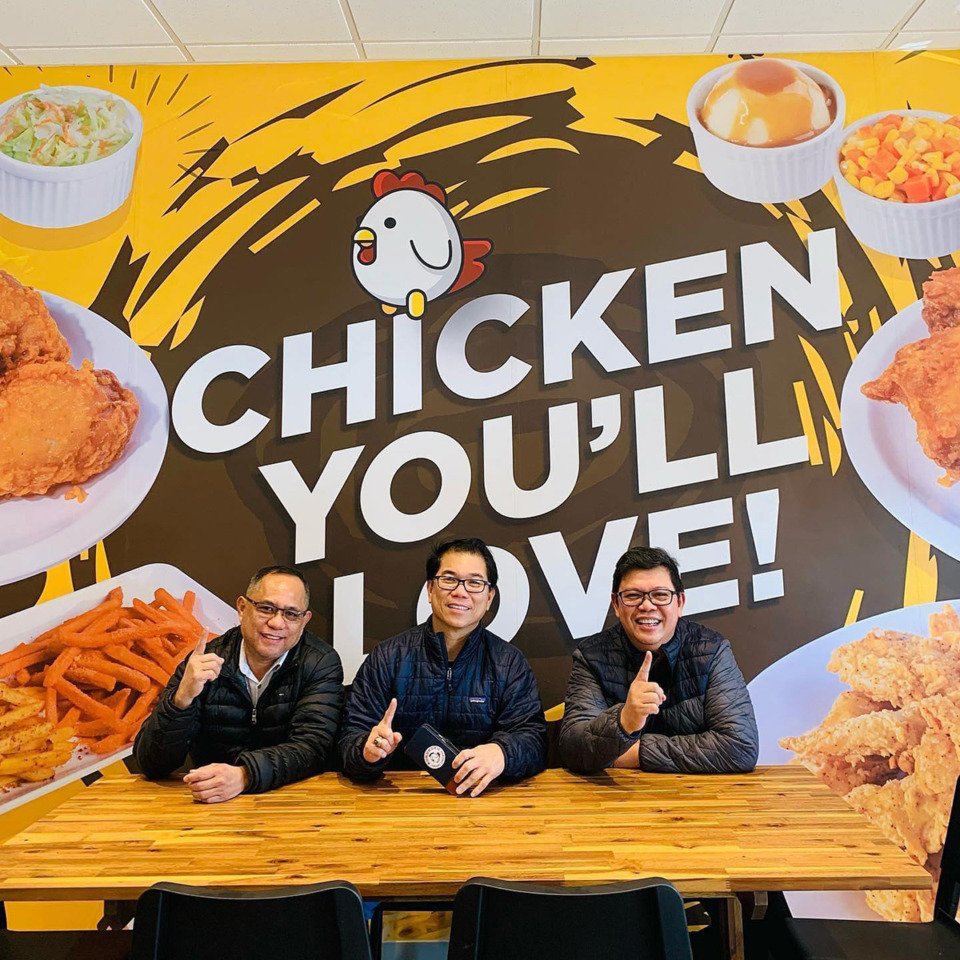 <strong>From left to right: Associate Joey Sabio, owner Roque Estipona and head of operations Danilo Pumarega pose in the Kukuruku Crispy Chicken at 8950 U.S. 64 in Lakeland.</strong> (Courtesy Kururuku Crispy Chicken)