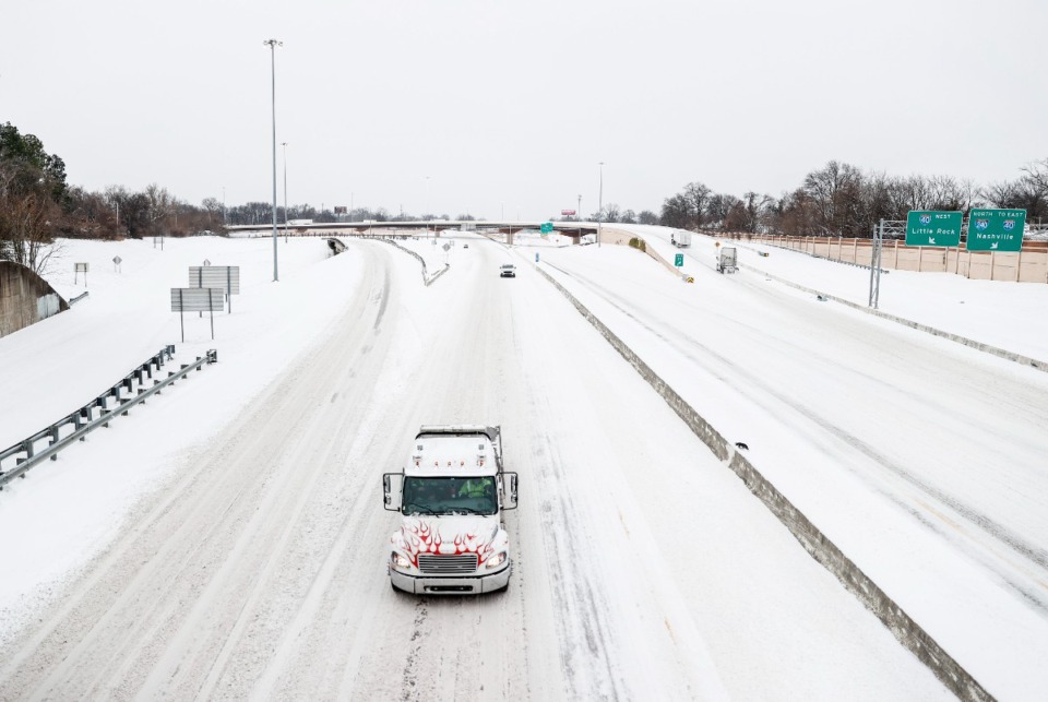 <strong>Drivers make their way down I-240 as snow falls on Monday, Jan. 15, 2024. Shelby County experienced eight weather-related deaths since winter weather hit the area Sunday, Jan. 14.</strong> (Mark Weber/The Daily Memphian)