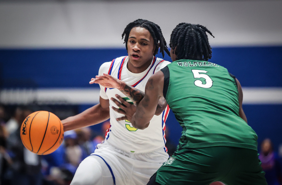 <strong>Bartlett High guard Christian Alston (5) drives to the basket during a Jan. 5 game against Cordova.</strong> (Patrick Lantrip/The Daily Memphian)