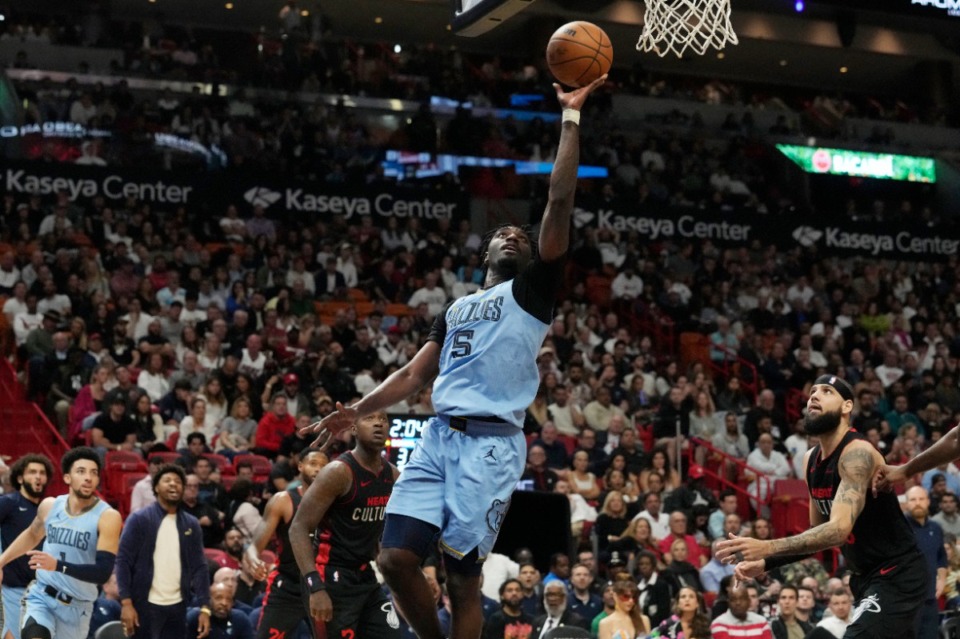 <strong>Memphis Grizzlies guard Vince Williams Jr. (5) drives to the basket against the Miami Heat, Wednesday, Jan. 24, 2024, in Miami, on the way to 25 points. The Grizzlies defeated the Heat 105- 96.</strong>(Marta Lavandier/AP)