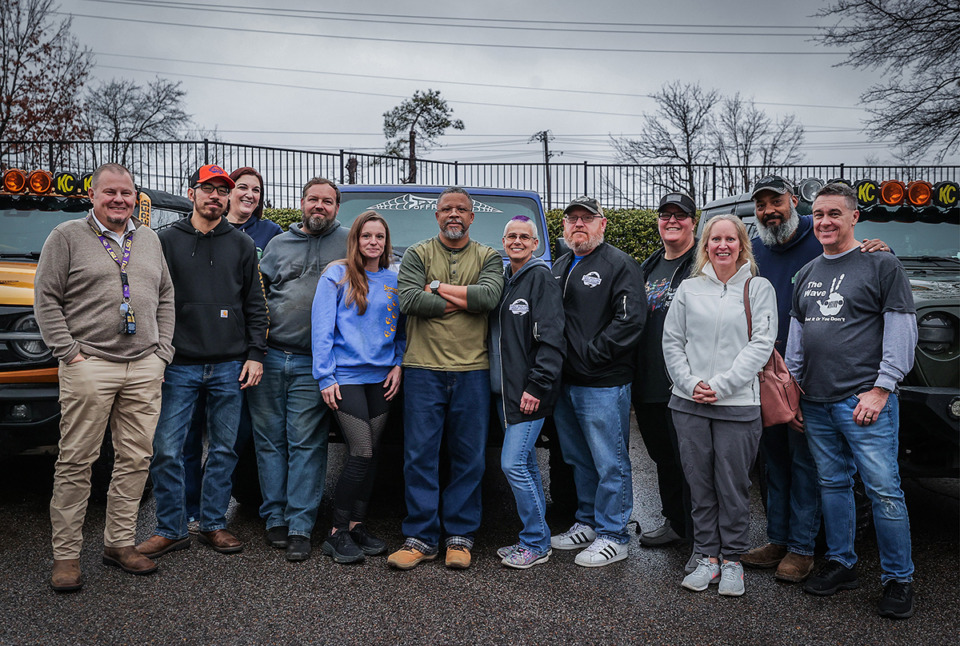 <strong>Members of the Mid-South Jeep Club posed for a portrait in front of their Jeeps parked outside St. Francis Hospital Jan. 24.</strong> (Patrick Lantrip/The Daily Memphian)