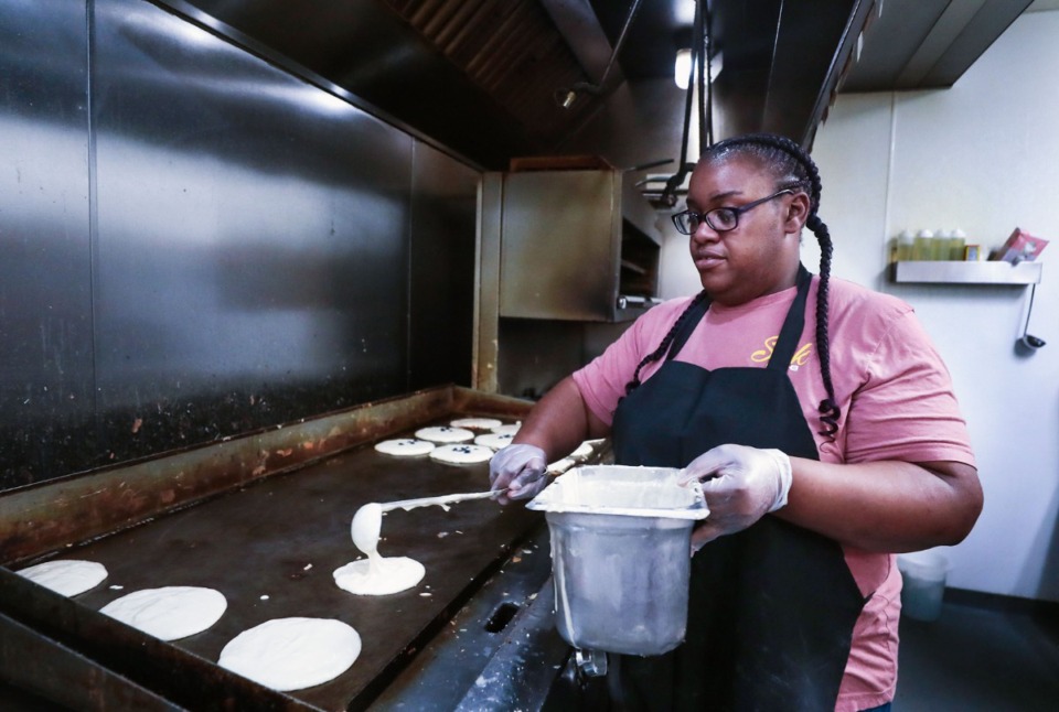 <strong>Deidre Dockery makes pancakes at Staks Germantown location May 13, 2022. Staks will start serving full-service&nbsp;&ldquo;brinner&rdquo;&nbsp;from 5 to 8 p.m. on the last Friday of every month.</strong> (Patrick Lantrip/The Daily Memphian file)