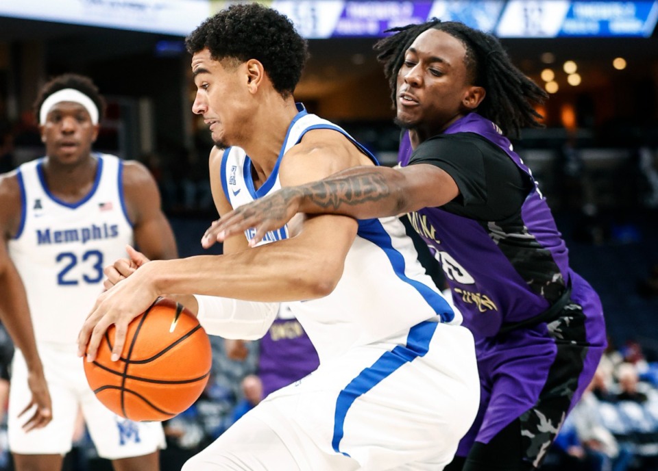 <strong>The Memphis Tigers have changed up the starting lineup for the Rice game.</strong> <strong>Nicholas Jourdain (with ball) and Jahvon Quinerly, who have been starting, will not start.</strong> (Mark Weber/The Daily Memphian file)