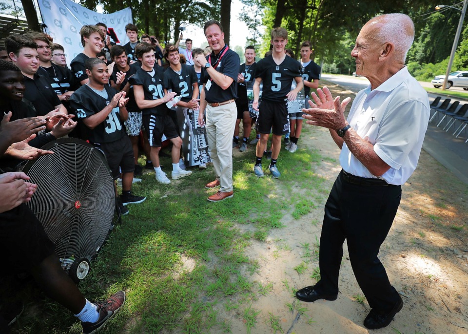 <strong>Major benefactor Mike Bruns (right) talks to the football team before a ceremony on July 10, 2019, at Houston High School to mark the start of construction on a new field house to be located adjacent to the football field. </strong>&nbsp;(Jim Weber/Daily Memphian)