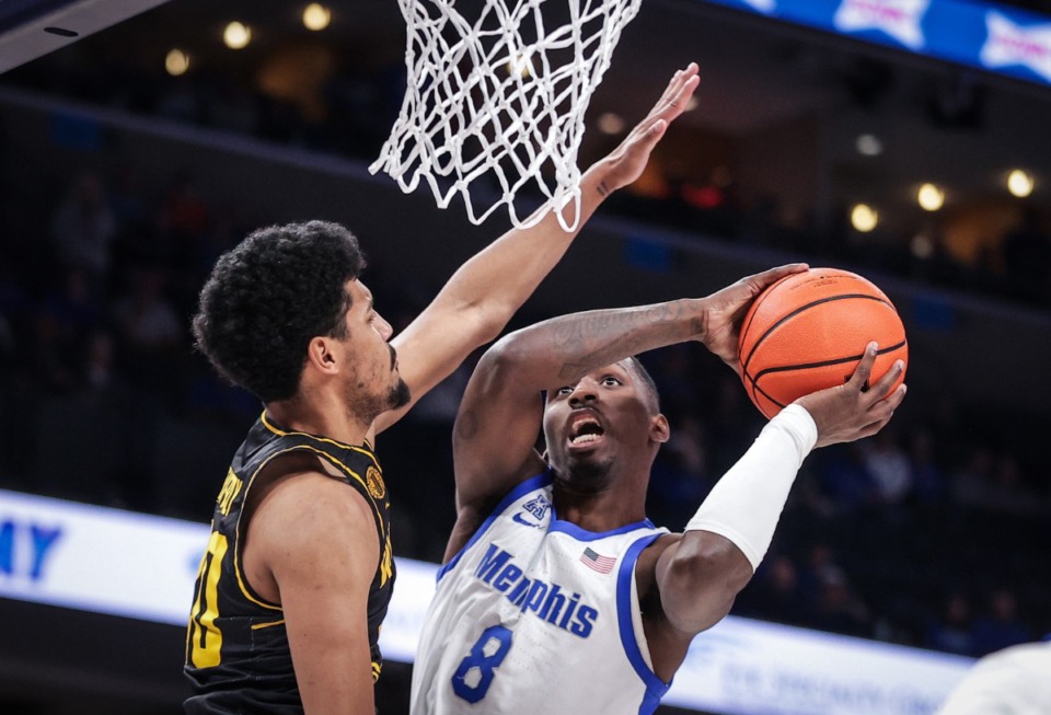 <strong>University of Memphis forward David Jones (8) goes up for a lay up during a Feb. 3 game against Wichita State.</strong> (Patrick Lantrip/The Daily Memphian)