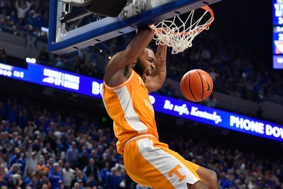 <strong>Tennessee guard Josiah-Jordan James (30) scores during the first half of an NCAA college basketball game against Kentucky in Lexington, Ky., Saturday, Feb. 3, 2024. Tennessee won 103-92.</strong> (AP Photo/Timothy D. Easley)