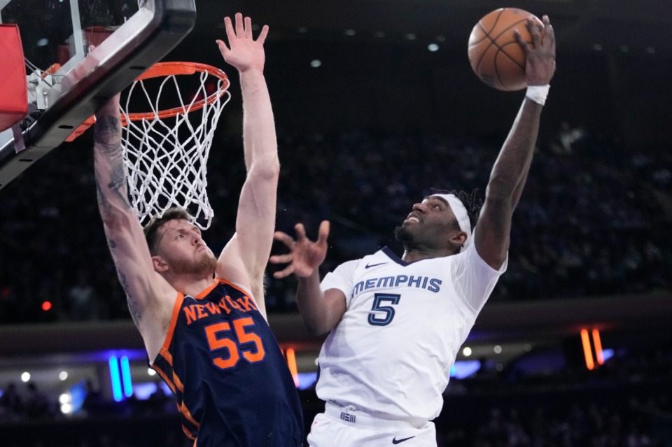 <strong>Memphis Grizzlies guard Vince Williams Jr. (5) goes to the basket against New York Knicks center Isaiah Hartenstein (55) on Feb. 6, 2024, at Madison Square Garden in New York. Williams led the Grizzlies with 19 points.</strong> (Mary Altaffer/AP)