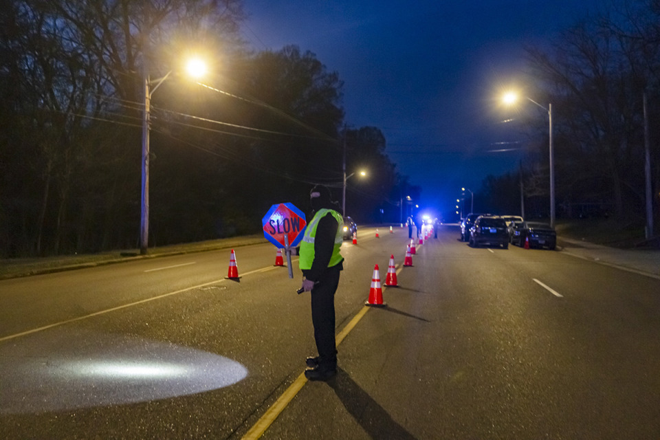 <strong>Memphis Police direct traffic under newly installed LED streetlights during LED streetlights in March 2023.</strong> (Ziggy Mack/The Daily Memphian file)