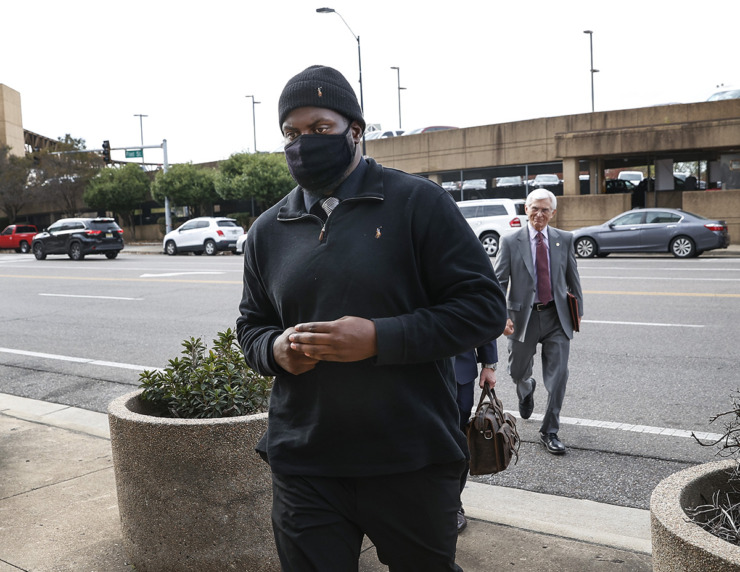 Former Memphis Police officer Emmitt Martin III and his lawyers enter the Odell Horton Federal Building on Nov. 14, 2023.&nbsp;During a hearing on Thursday, Feb. 8, U.S. District Judge Mark Norris, who is overseeing the case, granted an unopposed motion from lawyers for Martin. (Mark Weber/The Daily Memphian file)