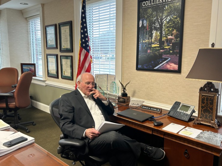 Collierville Mayor Stan Joyner calls Charles Green Friday, Feb. 9 to congratulate him on his appointment to the school board. (Abigail Warren/The Daily Memphian)