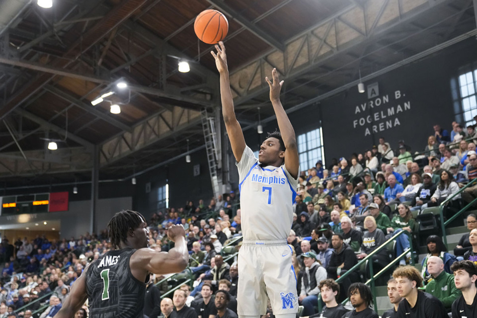 <strong>Memphis forward Nae'Qwan Tomlin (7) shoots over Tulane guard Sion James (1) during an NCAA college basketball game in New Orleans, Sunday, Jan. 21, 2024.</strong> (Gerald Herbert/AP Photo)