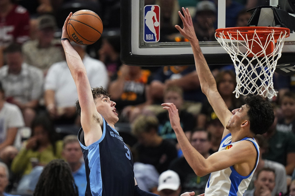 <strong>Memphis Grizzlies forward Jake LaRavia (3) goes to the basket as Oklahoma City Thunder forward Chet Holmgren defends during the second half of an NBA summer-league basketball game July 5, 2023, in Salt Lake City.</strong> (Rick Bowmer/AP file)