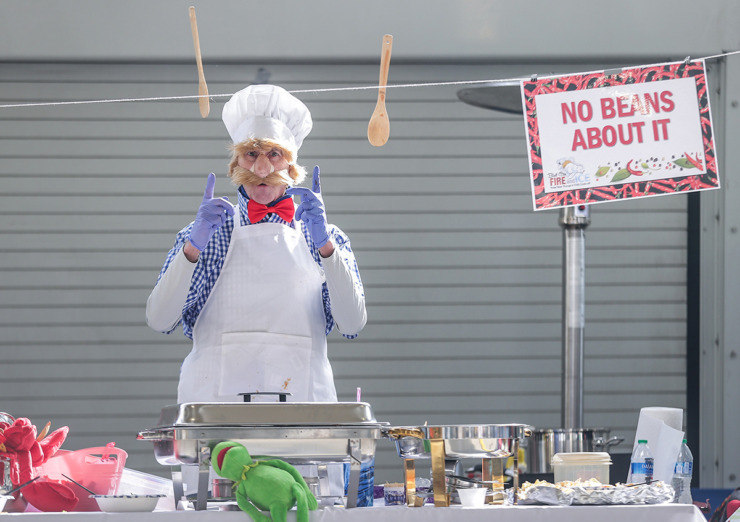 <strong>Will Dorothy, dressed as the Swedish Chef from the Muppets, tosses his stirring spoons into the air during the 17th annual Chili Cook-off and 26th annual Polar Bear Plunge Feb. 17.</strong> (Patrick Lantrip/The Daily Memphian)