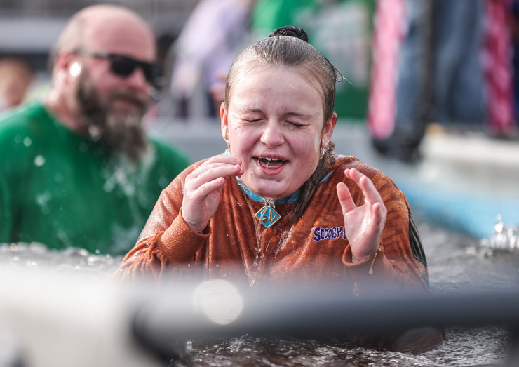 <strong>Nola Sampson, dressed as Scooby-Doo, reacts to the frosty water after participating in the 17th annual Chili Cook-off and 26th annual Polar Bear Plunge Feb. 17.</strong> (Patrick Lantrip/The Daily Memphian)