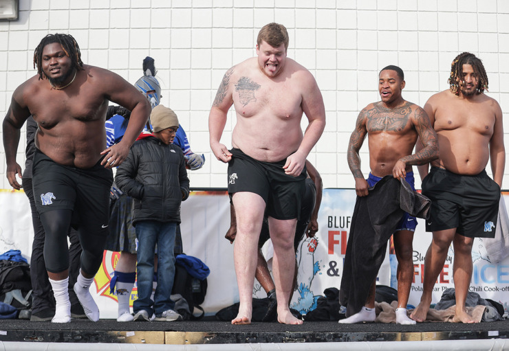 <strong>Several offensive lineman from the University of Memphis football team get ready to jump into the cold water during the 17th annual Chili Cook-off and 26th annual Polar Bear Plunge Feb. 17.</strong> (Patrick Lantrip/The Daily Memphian)