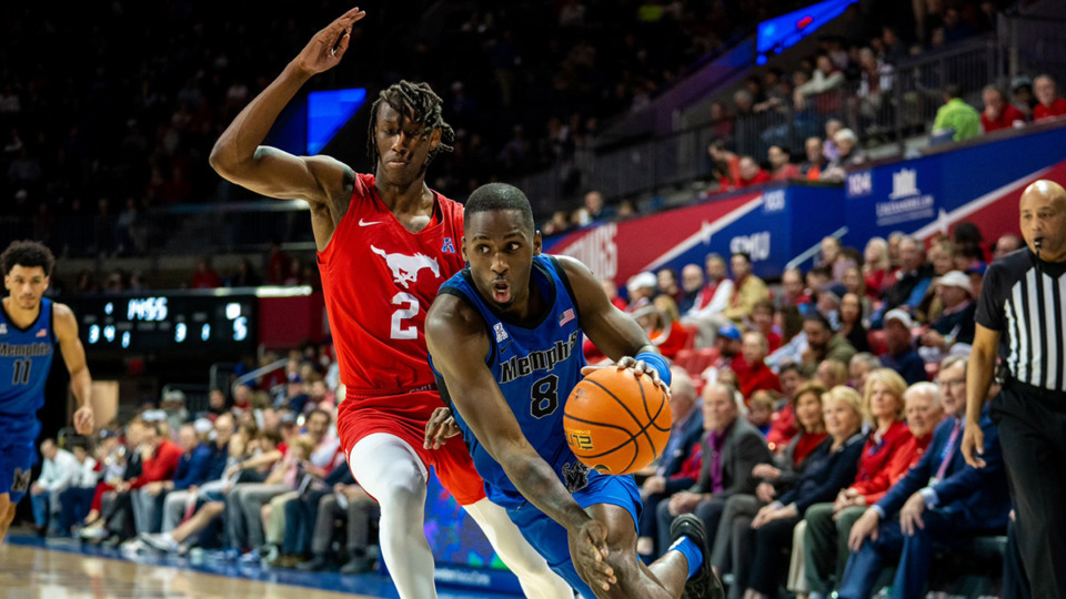<strong>Memphis forward David Jones (8) drives to the basket past SMU guard Jalen Smith (2) during the first half of an NCAA college basketball game in Dallas, Sunday, Feb. 18, 2024.</strong> (Courtesy Memphis Athletics)
