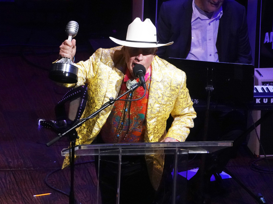 <strong>Memphis entertainer Jason D. Williams accepts an award as Musician of the Year at the Ameripolitan Awards Sunday Feb. 18. The awards recognize the best of honky-tonk, rockabilly, Western swing and outlaw country music.</strong> (Karen Pulfer Focht/Special to The Daily Memphian)