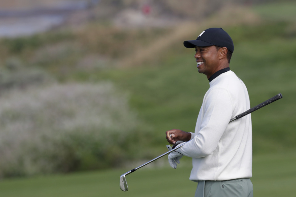 <strong>Tiger Woods smiles on the 10th fairway during a practice round for the U.S. Open Championship golf tournament Wednesday, June 12, 2019, in Pebble Beach, Calif.</strong> (AP Photo/Matt York)