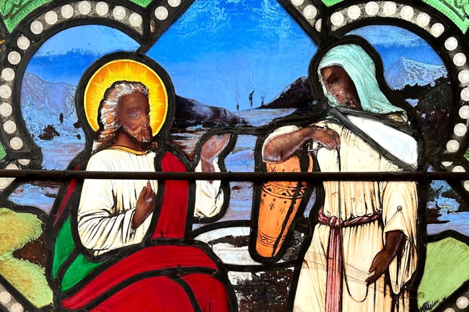 <strong>A nearly 150-year-old stained-glass window depicts Christ speaking to a Samaritan woman, in the now-closed St. Mark's Episcopal in Warren, R.I. After the church closed, the new owners of the building wanted the window to be displayed where the public could enjoy it.</strong>&nbsp;(AP Photo/Mark Pratt, File)