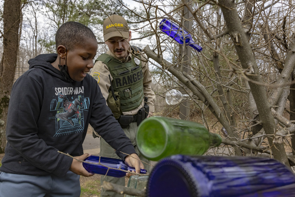 <strong>Bryce Ryans, left, and Tennessee State Park Ranger Daulton Degner create a glass bottle-tree at T. O. Fuller State Park in Westwood on Sunday, Feb. 25, 2024.</strong> (ZiggyMack/Special to The Daily Memphian)