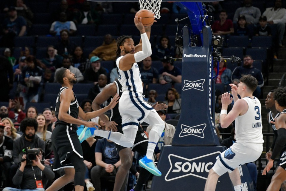 <strong>Memphis Grizzlies guard Derrick Rose goes up for a basket on Feb. 26, 2024, against the Brooklyn Nets.</strong>&nbsp;(Brandon Dill/AP)