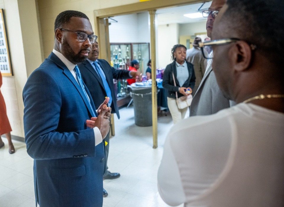 <strong>Memphis Mayor Paul Young stops to talk with an audience member before the town hall at Whitehaven High School Feb. 27, 2024.</strong> (Greg Campbell/Special to The Daily Memphian)