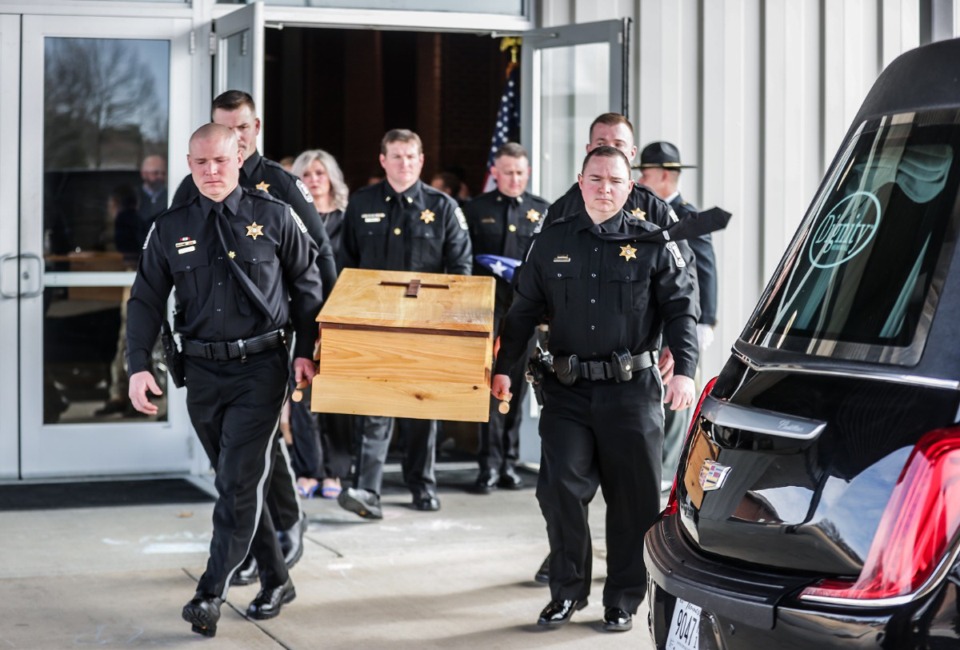 <strong>Officers carry the casket of Luca, a K-9 officer who was killed in the line of duty last week, at Longview Point Baptist Church in Hernando on Feb. 28, 2024.</strong> (Patrick Lantrip/The Daily Memphian)