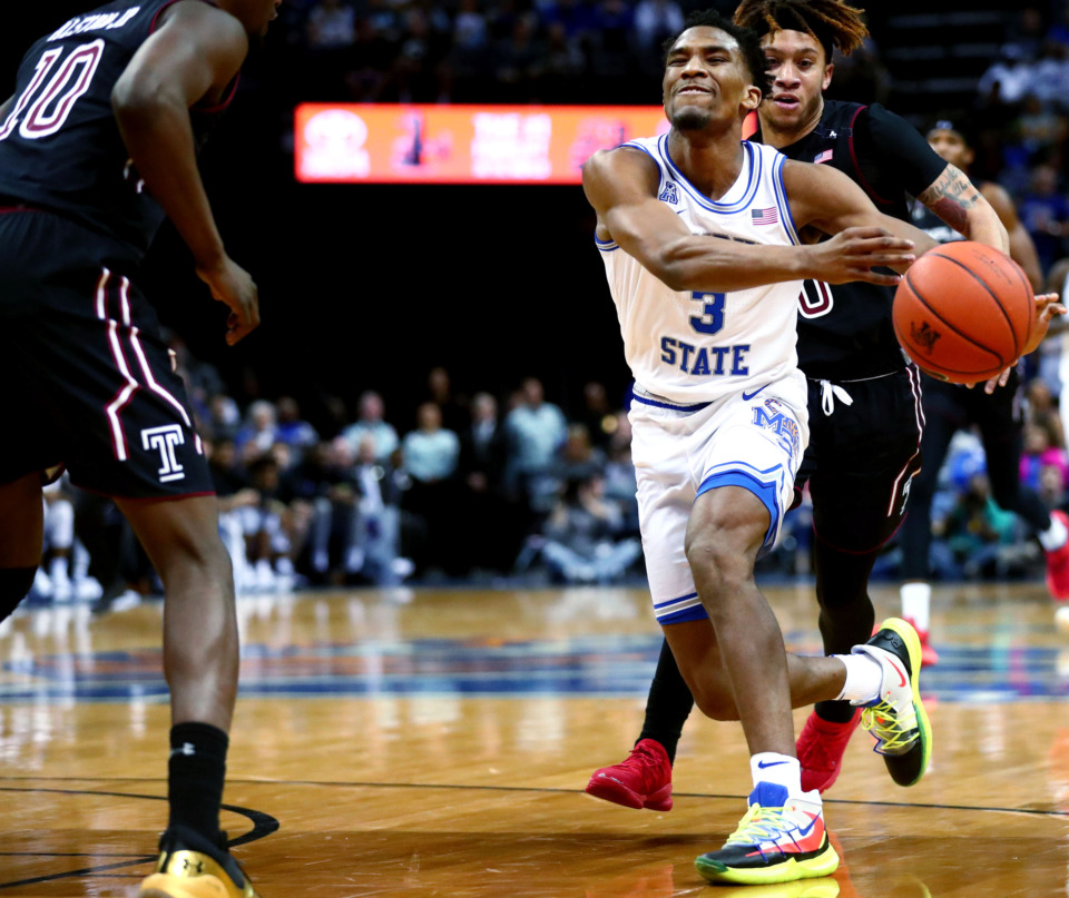<strong>Memphis Tigers guard Jeremiah Martin (3) reaches for the ball during a game against Temple on Feb. 26, 2019. Martin, who recently signed an Exhibit 10 deal with the Miami Heat, says Penny Hardaway's advice helped prepare him for the NBA Summer League.</strong> (Houston Cofield/Daily Memphian)