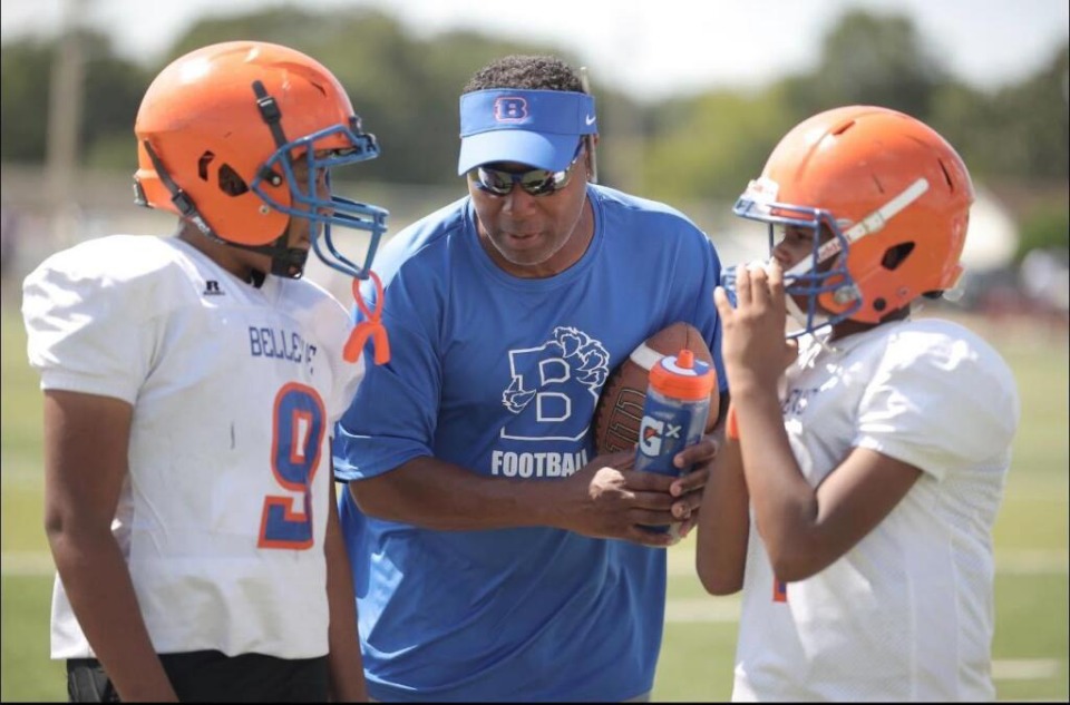 <strong>Adrian Goodrich, or &ldquo;Coach Skeet&rdquo; as his players called him, talks with team members of Bellevue Middle School&rsquo;s football team. He was an assistant coach for the team as well as a Bluff City High School teacher. (Courtesy Byron Harris)</strong>