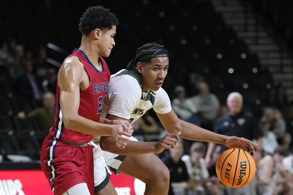 <strong>Briarcrest Christian forward Fred Smith (right) drives against Brentwood Academy's Ethan Hillsman during the first half of the Division II-AA championship basketball game March 2 in Cookeville, Tenn.</strong> (Mark Humphrey/Special to The Daily Memphian)